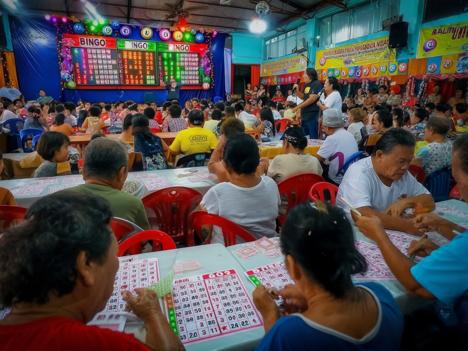 A lively bingo event with participants focused on their cards in a colorful room filled with excitement and anticipation.